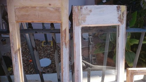 this shows the new spliced timbers on the sash restoration of the side window in Brighton, East Sussex