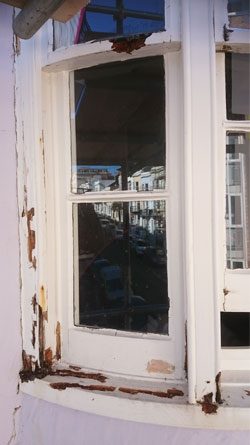 before all the rot was removed on the sash window frames were restored in Brighton, East Sussex