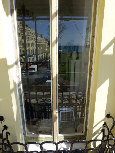 Full length picture of the size of the French doors externally with the preservative that will protect the French doors in the future