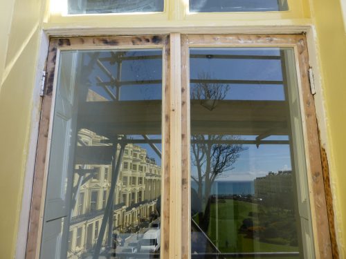 External restored regency doors in Brighton and Hove fully preserved with the Dulux Weathershield preservative primer in Brunswick Square Hove