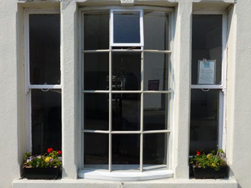 This show the finished bowed replacement sash and casement window in Worthing, West Sussex