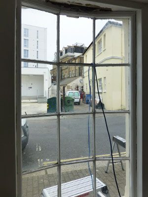 The old casement window before anything happened and we started to really take it apart in worthing west sussex
