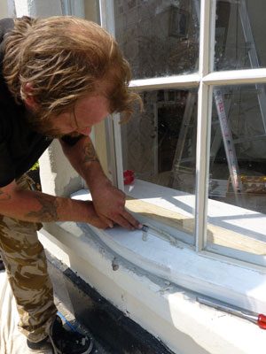 re-glazing windows it was very hard due to lack of space that we had to do the putty sight lines with the replacement glass in worthing west sussex