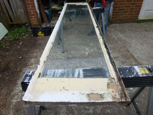 french doors in the workshop facilities getting restored in hove