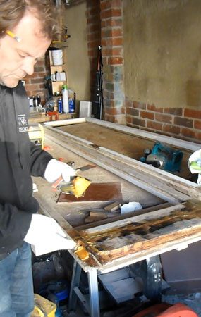 Process during the restoration of the french doors after the door repairs have been done in Brunswick Square Hove, East Sussex