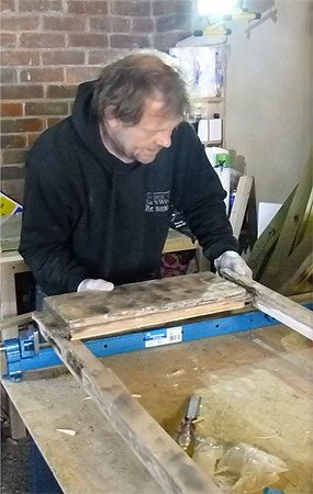 installing new bottom rails to french doors in our window and door workshop facility Hove East Sussex