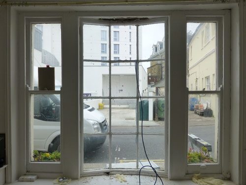 before the restoration of the window replacement when the glazing has just been taken out in Worthing Brighton Hove and Sussex
