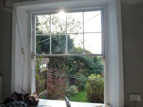 The top sash of the window installed with the draught excluder system in Brighton and Hove east sussex