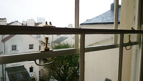 full sash window restoration including painting and decorating of the sash windows Brunswick square Hove east Sussex